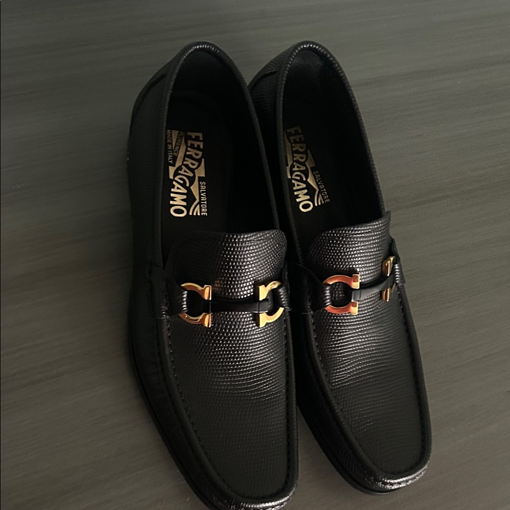 Salvatore Ferragamo Black Textured Loafers with Gold Accents
